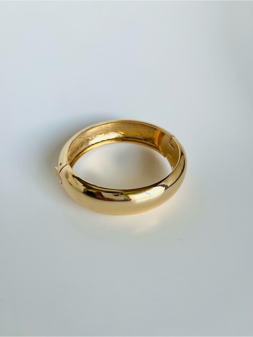 Polished Gold-Tone Dome Hinged Bangle Bracelet
